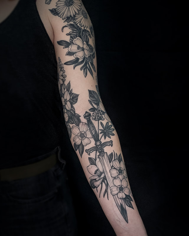 Tattoo by Adam LoRusso artist black and grey boston floral fine line sleeve
