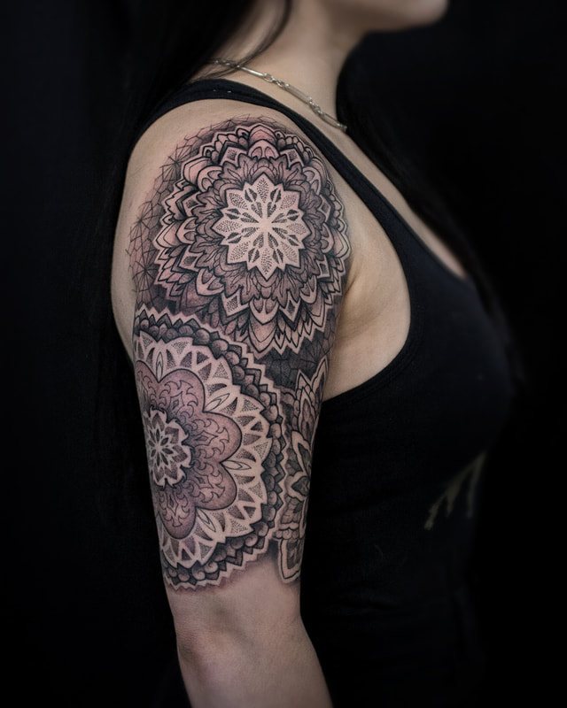 Tattoo by Adam LoRusso artist black and grey boston mandala half sleeve