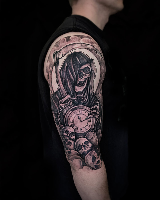 Tattoo by Adam LoRusso artist black and grey boston reaper sleeve

