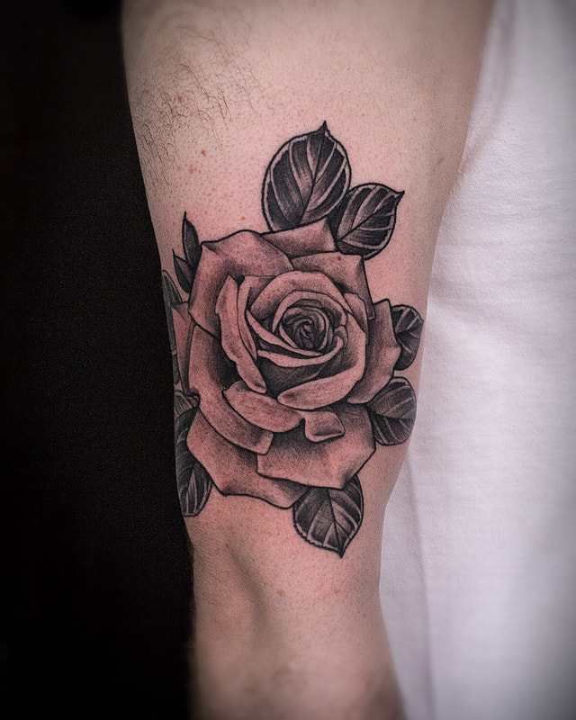 Tattoo by Adam LoRusso artist black and grey boston rose tattoo