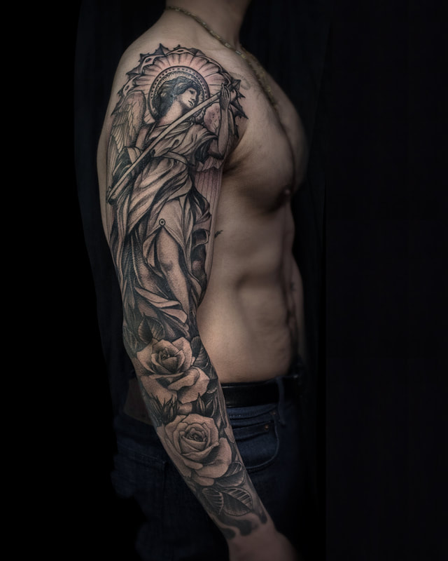 Tattoo by Adam LoRusso artist black and grey boston angel sleeve