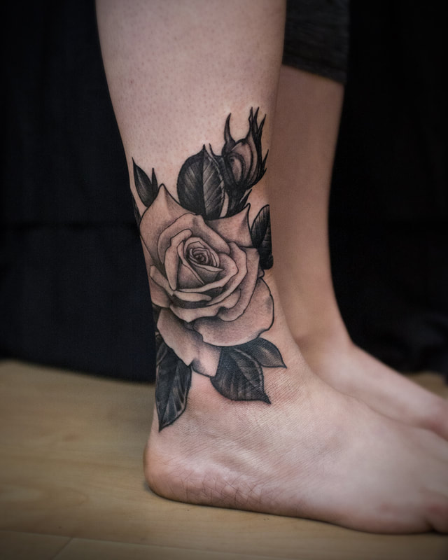 Tattoo by Adam LoRusso artist black and grey boston rose tattoo